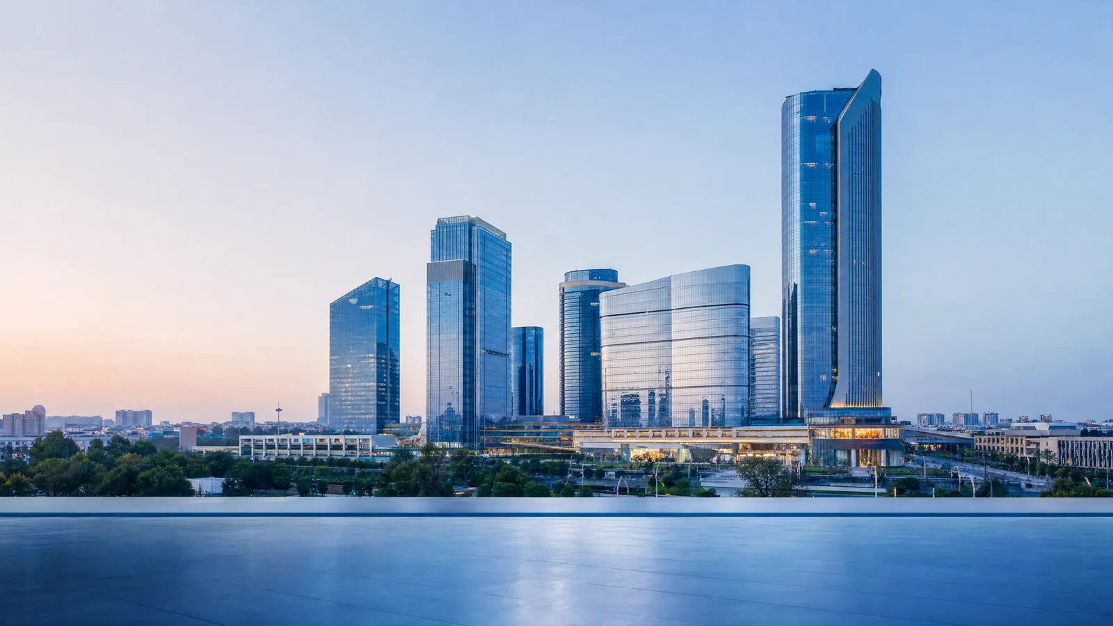 Modern Tashkent, Uzbekistan business district skyline at dusk
