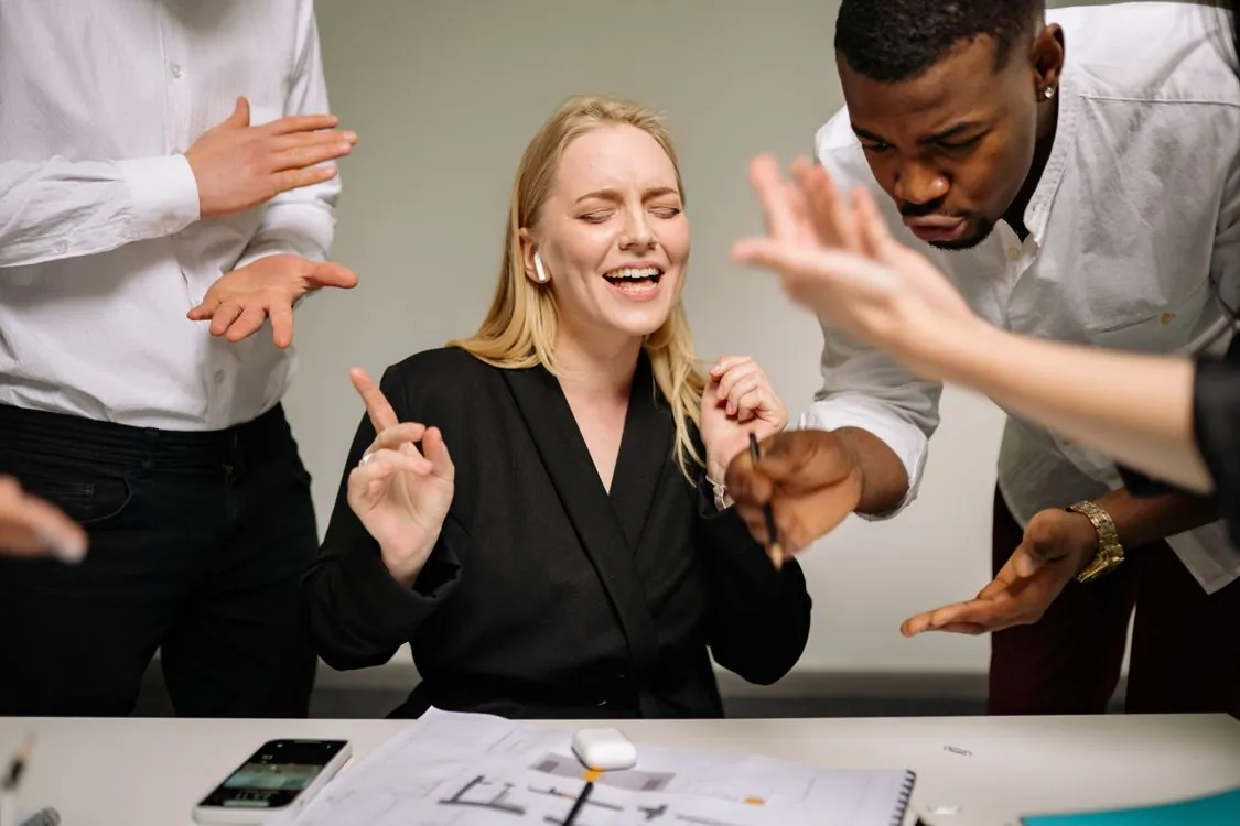 Business professionals in an animated discussion during a sales discovery call